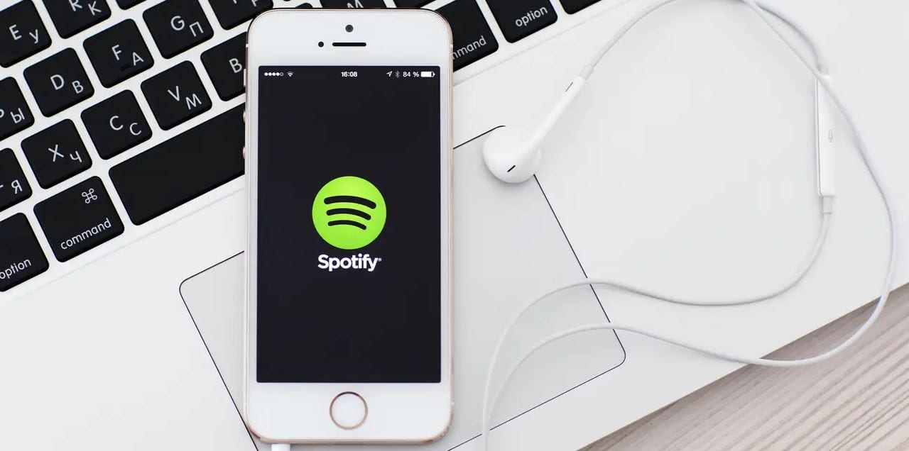 colocar musica do spotify em repeat